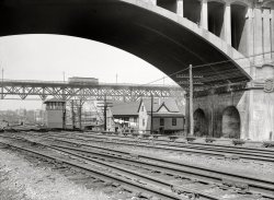 April 1936. "Housing conditions in crowded parts of Milwaukee. Housing under the Wisconsin Avenue viaduct." Photo by Carl Mydans for the Resettlement Administration. View full size.