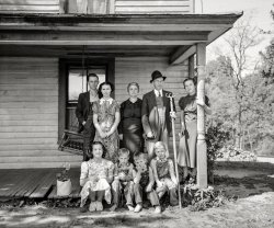 April 1938. "North Carolina farmer and family. Guilford County." Medium format negative by John Vachon for the Farm Security Administration. View full size.