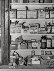 Summer 1938. "General store interior. Florence County, South Carolina." A variety of unpleasant-looking nostrums from the punishment pharmacopoeia. Who wants saltpeter? From the FSA archive, credited to "Cox, photographer." View full size.