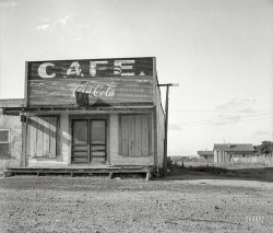June 1937. "Abandoned cafe in Carey, Texas. Carey is fast becoming a ghost town of the Texas plains." Medium format negative by Dorothea Lange. View full size.
