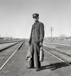 June 1939. West Carlin, Nevada. "Brakeman on the Union Pacific Challenger." Photo by Dorothea Lange for the Farm Security Administration. View full size.