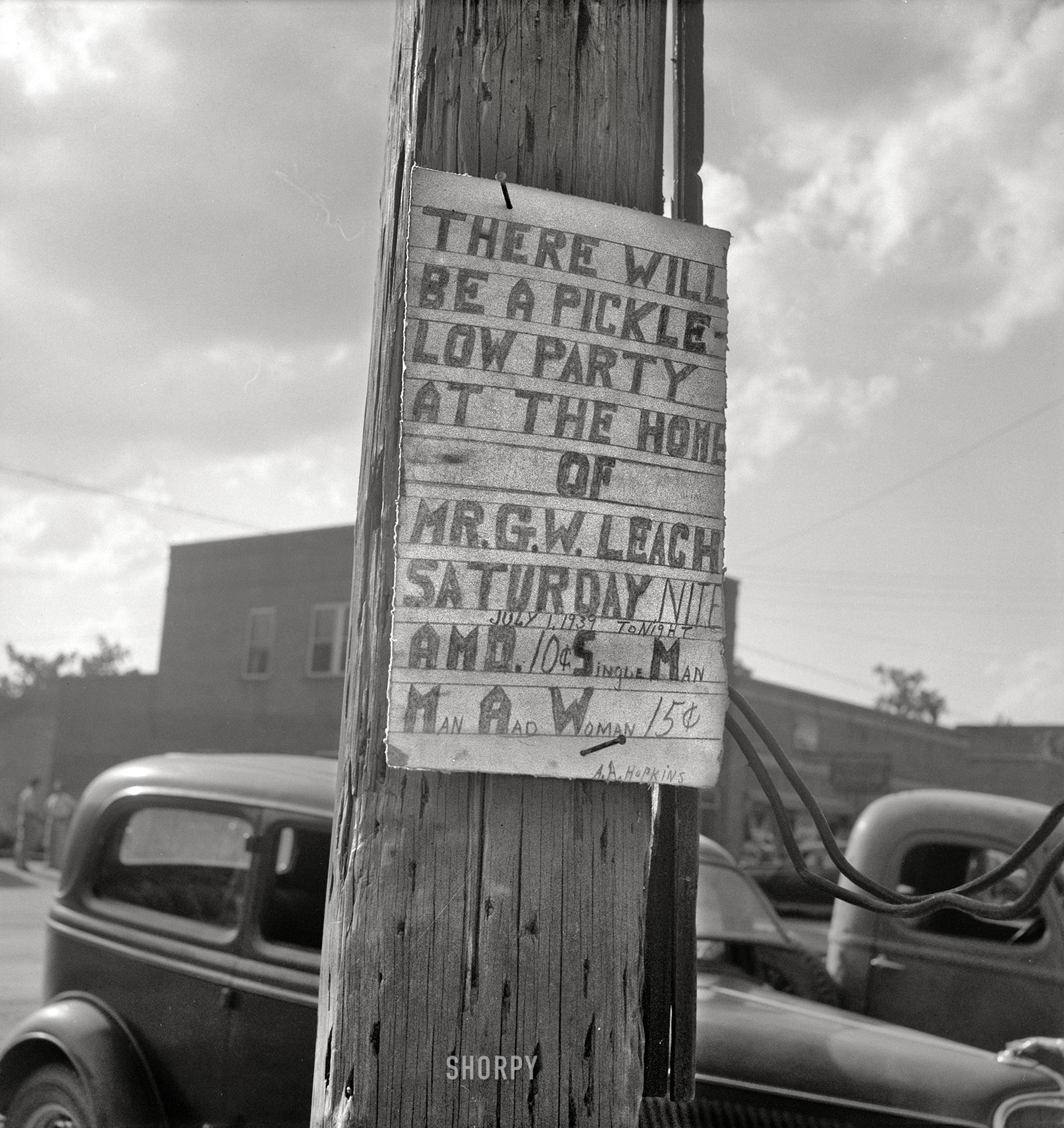 July 1939. "Sign tacked to pole near the post office. Main street, Pittsboro, North Carolina." This photo by Dorothea Lange, which has attracted no small amount of bemused commentary over the years, requires two avenues of explanation. The first is that Lange was a connoisseur of quirky signage, snapping away at whatever outre malapropism, mangled spelling or jarring juxtaposition might present itself by the side of the road  (see here, here, here, here and here; there are dozens more). The second is that "piccolo" was Depression-era slang for jukebox or nickelodeon; a piccolo party's dancing was to canned music rather than a live band. Hence the PICKLE-LOW PARTY that will go on forever, thanks to the combined efforts of G.W. Leach, A.A. Hopkins and D. Lange. View full size.