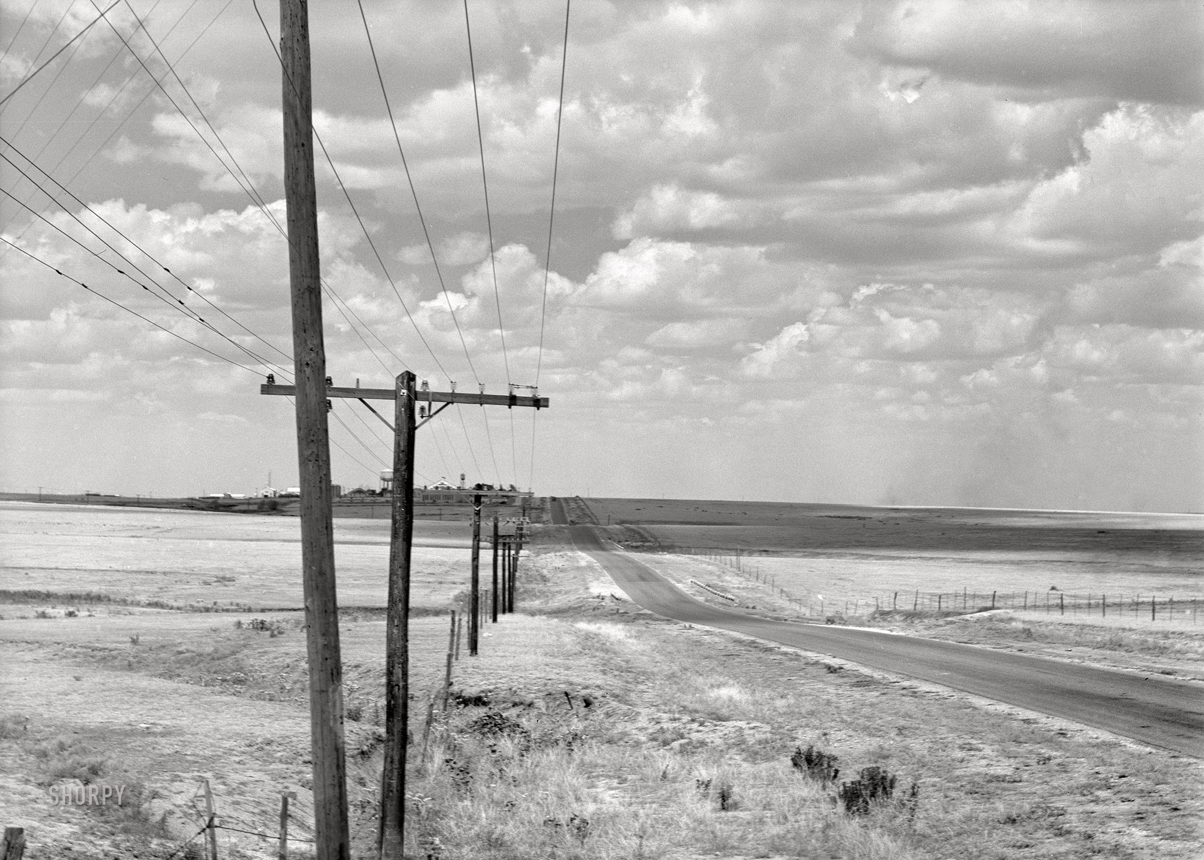 August 1939. "Great Plains and highway north of Amarillo, Texas." Medium format nitrate negative by Dorothea Lange for the Farm Security Administration. View full size.
