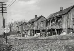 April 1937. "Coal miners' housing in Birmingham, Alabama." Photo by Arthur Rothstein for the Resettlement Administration. View full size.