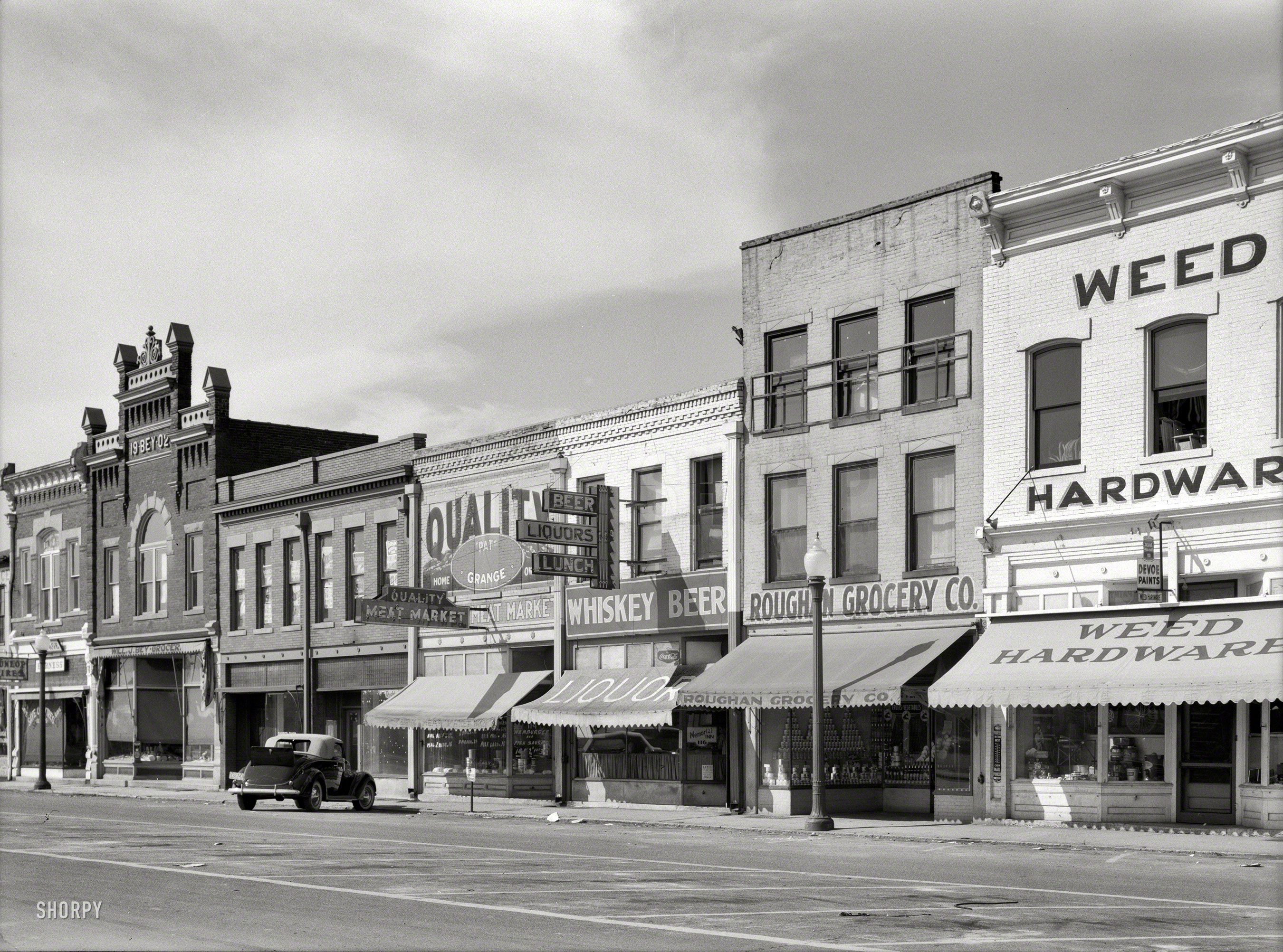 June 1938. "Stores on Sunday. Vincennes, Indiana." Medium format negative by Arthur Rothstein for the Farm Security Administration. View full size.