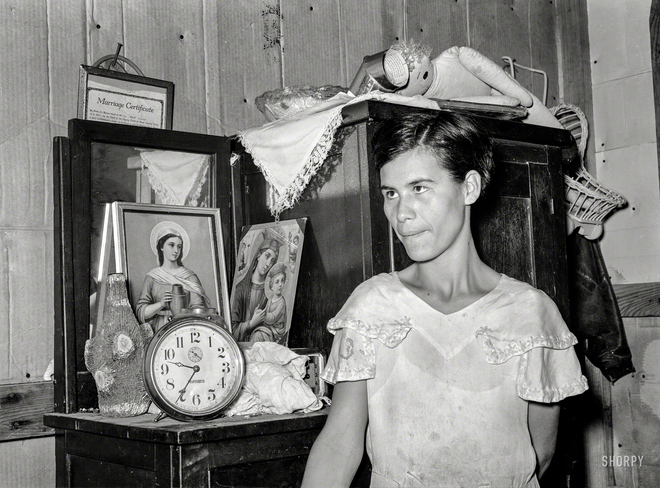 March 1939. "Mexican woman standing in front of bureau. San Antonio, Texas." Medium format nitrate negative by Russell Lee. View full size.