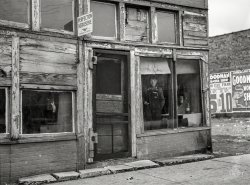 January 1939. "Abandoned store in which coal miner on relief lives. Zeigler, Illinois." Medium format negative by Arthur Rothstein for the Farm Security Administration. View full size.