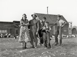 October 1939. "Family of Fred Schmeeckle, Farm Security Administration borrower, on their dryland farm in Weld County, Colorado." Medium format acetate negative by Arthur Rothstein for the FSA. View full size.