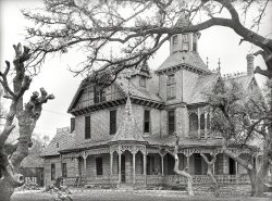 November 1939. "Old mansion in Comanche, Texas." Boo, y'all! Medium format negative by Russell Lee for the Farm Security Administration. View full size.
Oakland HeightsAs a native of Comanche, Texas, I can say for certain that the house was named Oakland Heights, and was built before 1887 by a man named Dexter Walcott. (The street which ran in front of the house is still named Walcott Avenue.) A man named F. M. Browne added the Victorian decorations and additional stories a few years after. It stood on one of the tallest points in the town, befitting its name. The house was a showpiece in its early years, but fell into ruin as the family died out. (By the time of this photo, it may have been already vacant.) It was torn down as a derelict in the 1950s and replaced by a ranch-style home which stands on the site today, using the original house's foundation.
Oakland Heights also served as the model for the cover of Richard Brautigan's novel "The Hawkline Monster," according to cover artist Wendell Minor.
DetailsA lot of gingerbread on this house.  And the brickwork on the chimney is fantastic!
Vacation plansIs there perhaps a motel nearby?
Check out timeApparently, the trees are leafing the mansion.
I wonderThere is some lettering above the entrance on the far right. Any chance of seeing a closeup?
[OAKLAND HEIGHTS, maybe. Or OAKLAWN. - Dave]
I recognize the house!This is the Texas residence known as the old Addams place. Inhabited by a family of very exotic yet loving souls, it’s their southern vacation villa for use in hurricane season. Pan-dimensional, all of the windows face south to take advantage of looming storms.
Room with a viewI want to be in that fourth-story cupola, sitting in a swivel chair.
(The Gallery, Russell Lee)