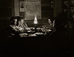 October 1940. "Farm family after evening meal. Pie Town, New Mexico." Medium format acetate negative by Russell Lee for the Farm Security Administration. View full size.