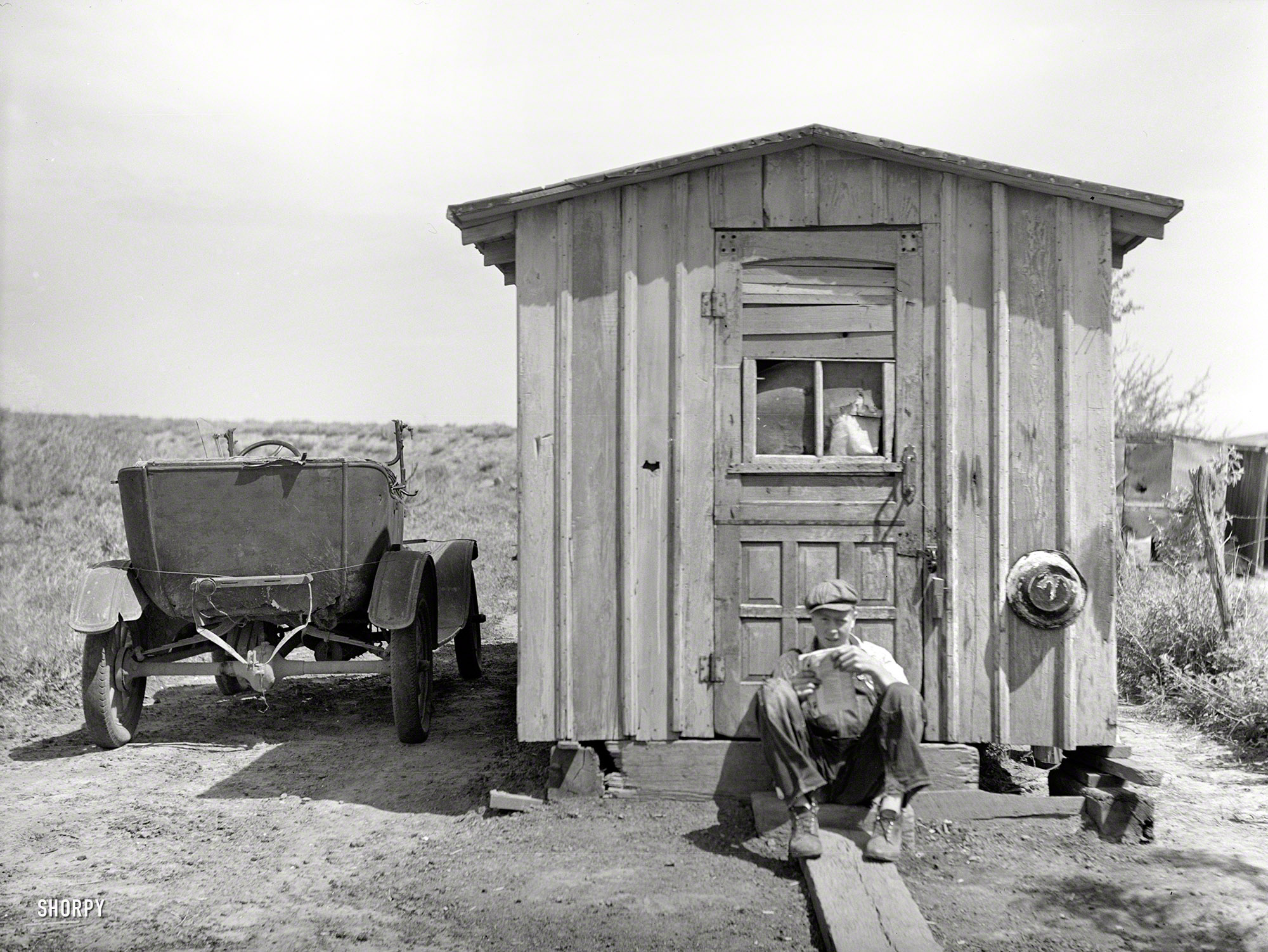 May 1936. "Home of worker in strip coal mine. Cherokee County, Kansas." Photo by Arthur Rothstein for the Resettlement Administration. View full size.