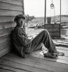 July 1937. "Sharecropper boy near Chesnee, South Carolina." Photo by Dorothea Lange for the Resettlement Administration. View full size.