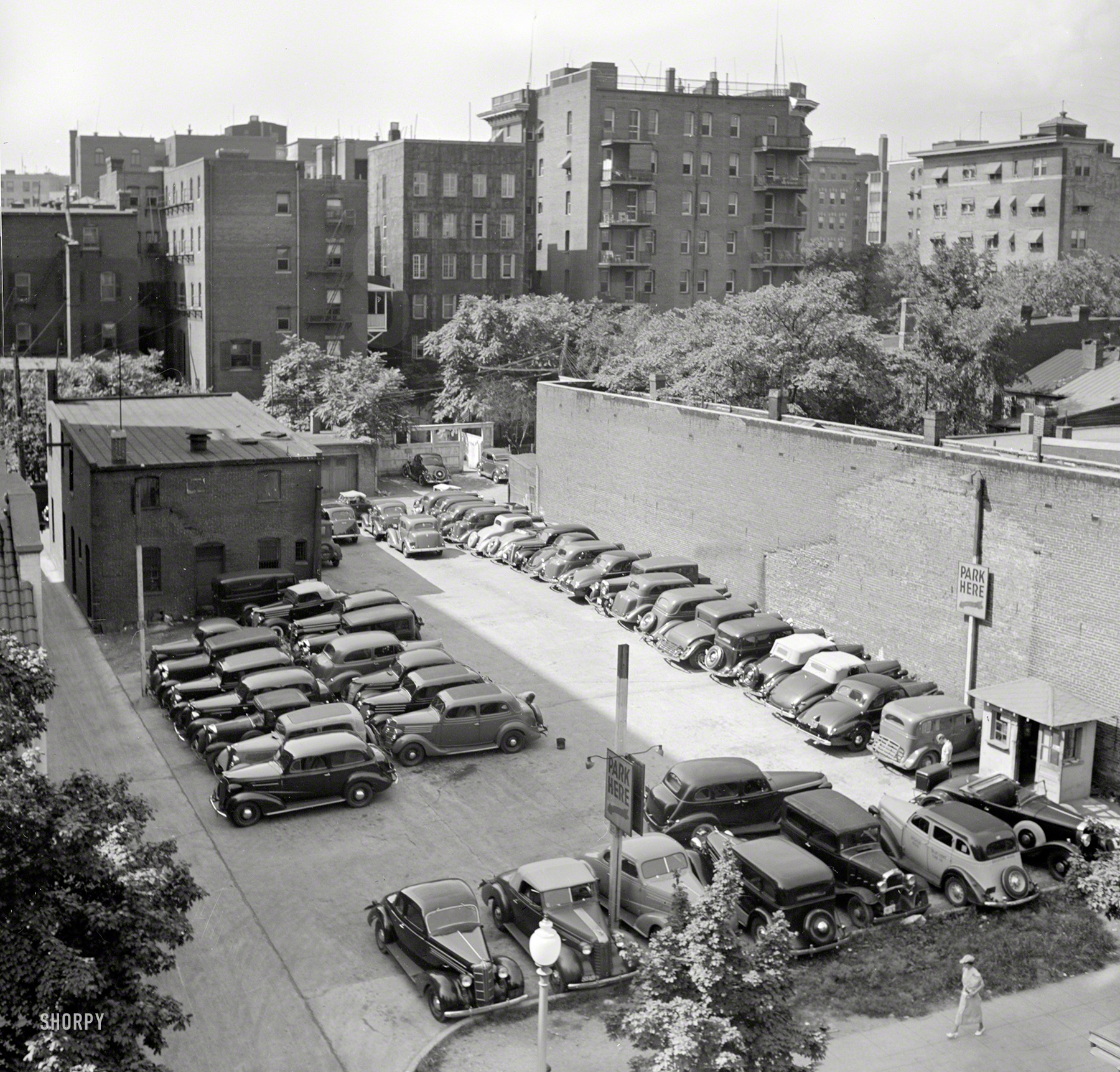 July 1937. "Parking lot in Washington, D.C." Medium-format negative by Russell Lee for the Resettlement Administration. View full size.