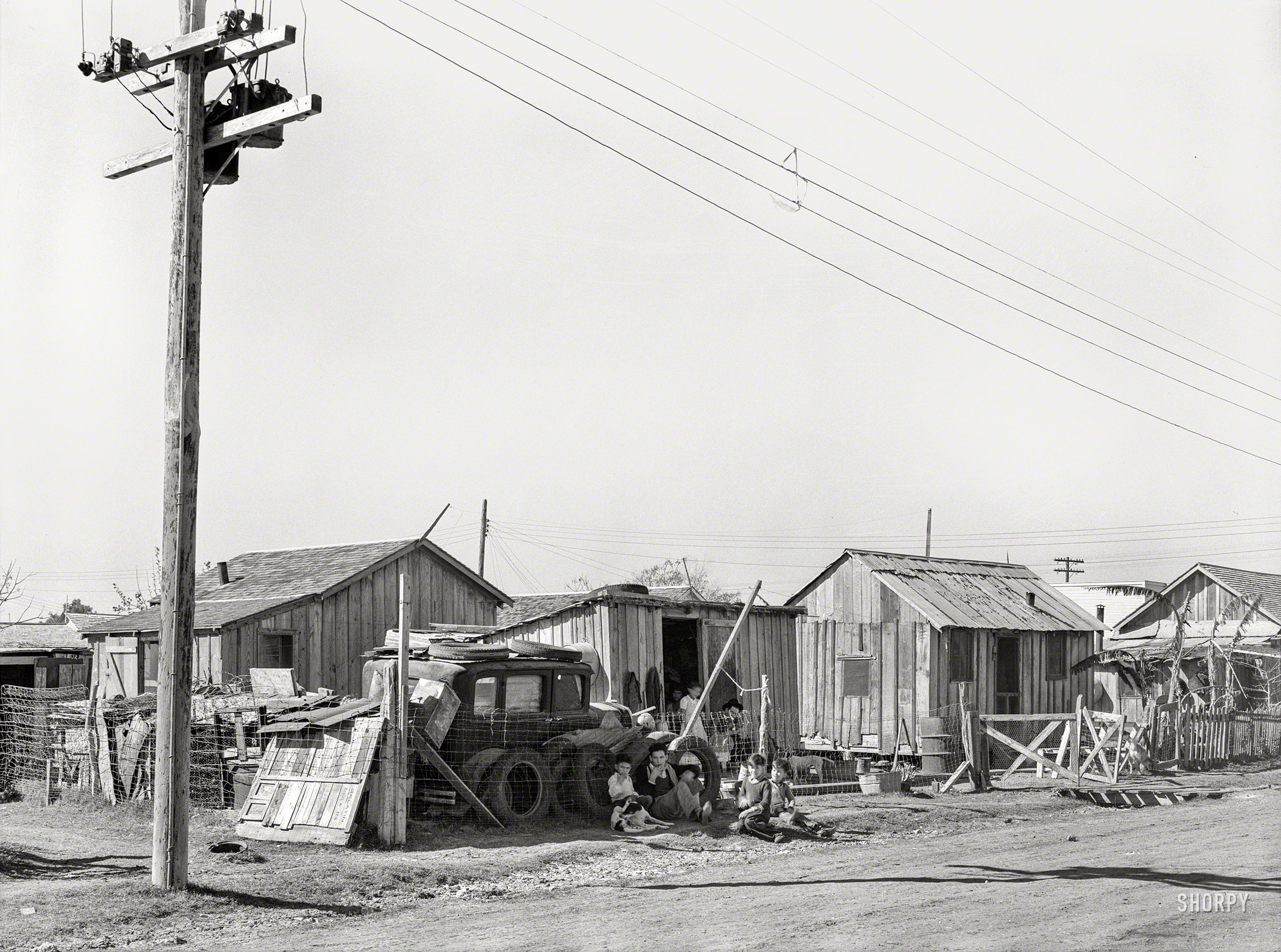 February 1939. "Housing. Mexican district in Robstown, Texas." Medium format negative by Russell Lee for the Farm Security Administration. View full size.
