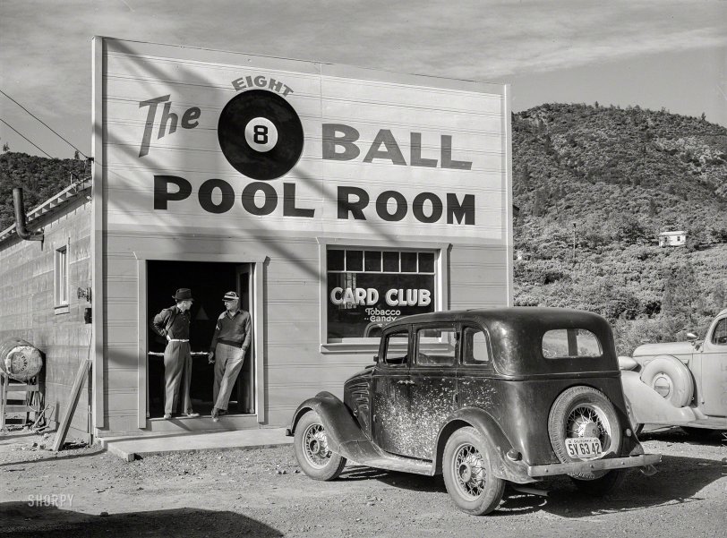 November 1940. "Pool hall in Shasta County, California." Recreation for the workers and engineers building the Shasta Dam across the Sacramento River. Photo by Russell Lee for the Farm Security Administration. View full size.
