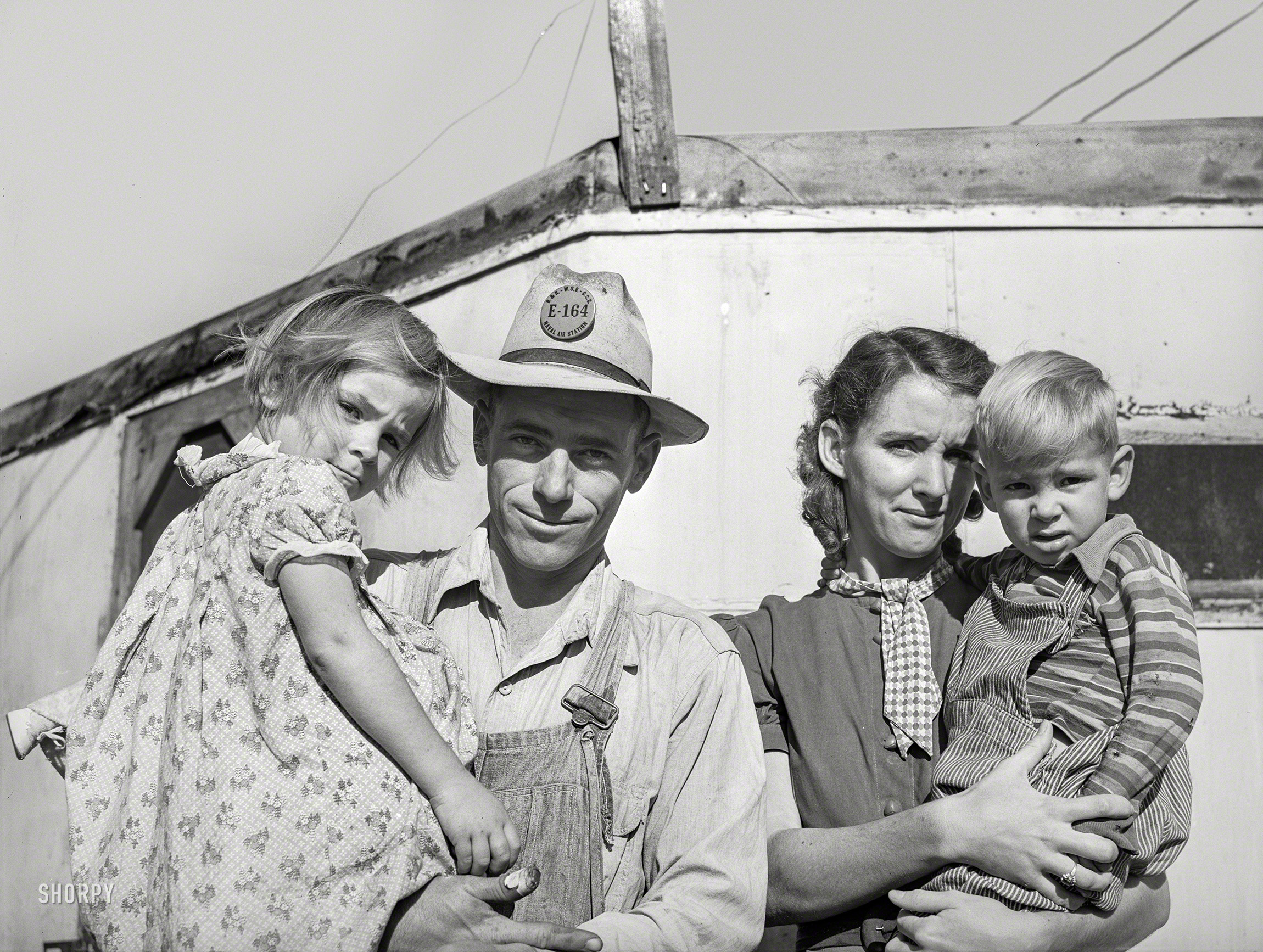 December 1940. "Family of carpenter's helper who live in a trailer. Corpus Christi, Texas." Medium format acetate negative by Russell Lee. View full size.