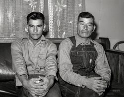December 1940. "Japanese fruit farmer and his son. Placer County, California." Photo by Russell Lee for the Farm Security Administration. View full size.