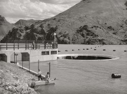 May 1941. Malheur County, Oregon. "Glory hole of the Owyhee Reservoir. Water for the Vale-Owyhee irrigation project is impounded here." Medium format acetate negative by Russell Lee for the Farm Security Administration. View full size.