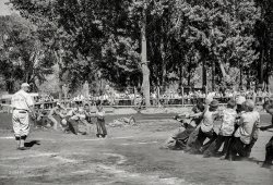 July 1941. "Kids' tug-of-war at the Fourth of July celebration at Vale, Oregon." Photo by Russell Lee for the Farm Security Administration. View full size.