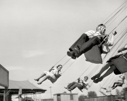 July 1941. "Ride at the carnival which was part of the Fourth of July celebration at Vale, Oregon." Medium format negative by Russell Lee. View full size.