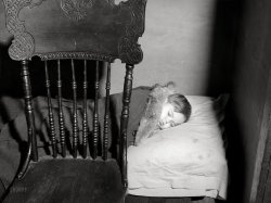 1938. "New York, New York. A boy sleeping at his home on East 62nd (or 63rd) Street." Medium format acetate negative by Sheldon Dick. View full size.