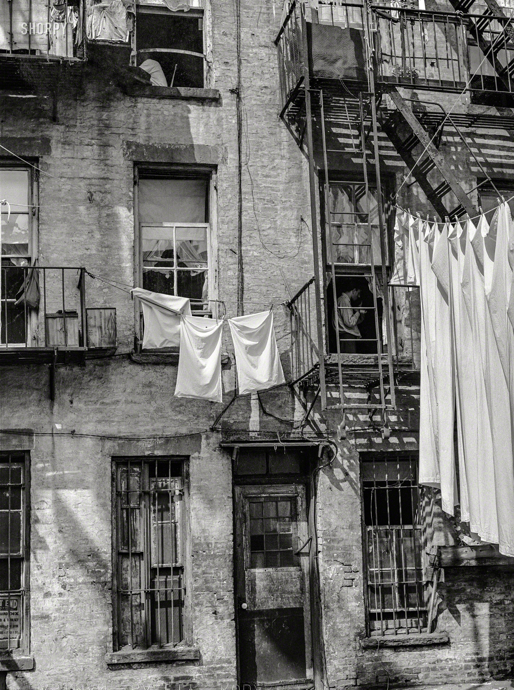 1938. "New York, New York. East 63rd Street apartments." Medium format negative by Sheldon Dick for the Farm Security Administration. View full size.