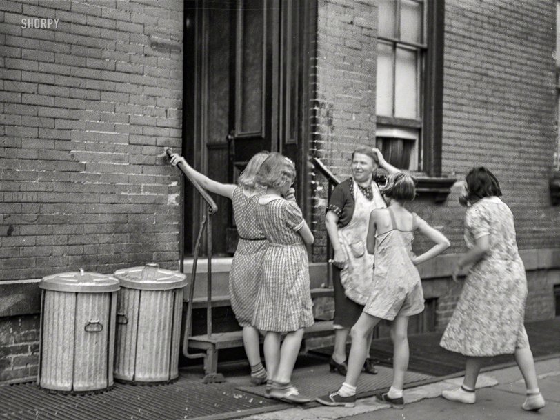 New York, 1938. "Woman and girls at the back of an apartment house on East 63rd Street." Medium format negative by Sheldon Dick. View full size.
