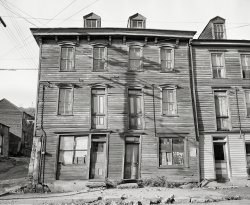 1938. "Shenandoah, Pennsylvania. House fronts in a mining town." The off-kilter castle last seen here. Acetate negative by Sheldon Dick. View full size.