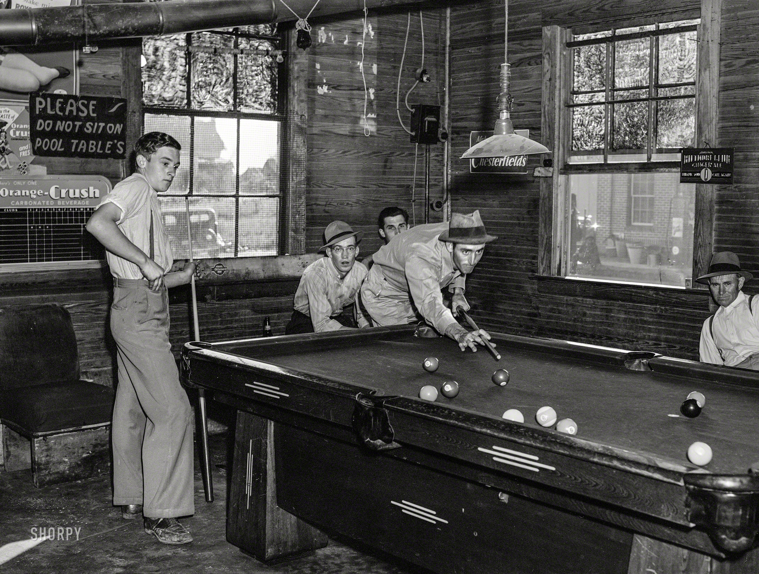 May 1940. "Interior of general store and poolroom at Stem, Granville County, North Carolina." Medium format negative by Jack Delano. View full size.