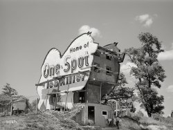 June 1940. "One-spot town along U.S. Highway No. 1, between Washington and Baltimore." Jessup, Maryland, was the corporate headquarters of flea-powder manufacturer One-Spot. Medium format negative by Jack Delano. View full size.