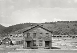 September 1940. "House in near-deserted town of Tyler, Pennsylvania, showing abandoned coke ovens in background." Medium format acetate  negative by Jack Delano for the Farm Security Administration. View full size.