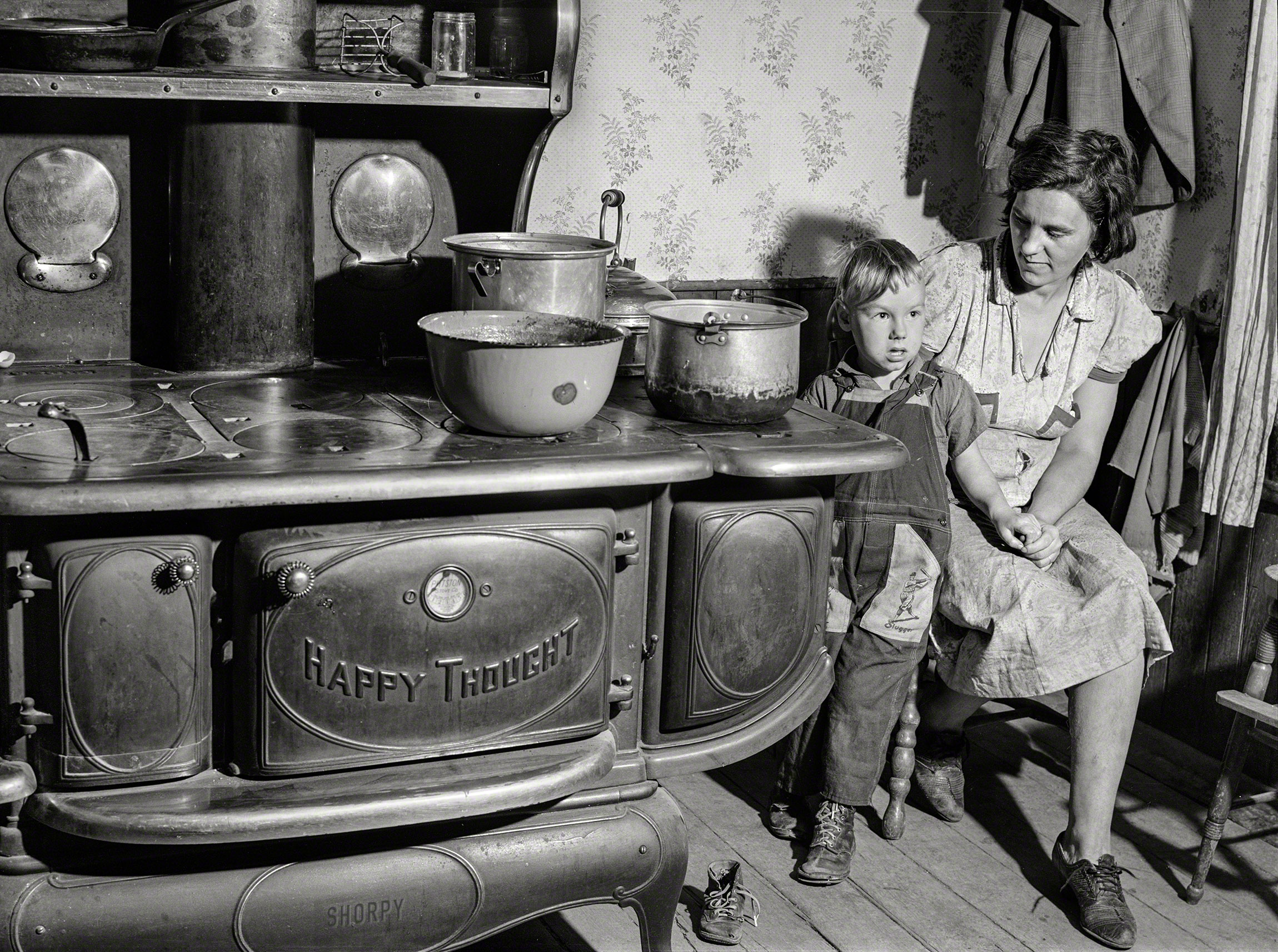 September 1940. "Mrs. Garland and her little boy. Family lives in the submarginal farm area of Rumsey Hill, near Erin, New York." Medium format acetate negative by Jack Delano for the Farm Security Administration. View full size.