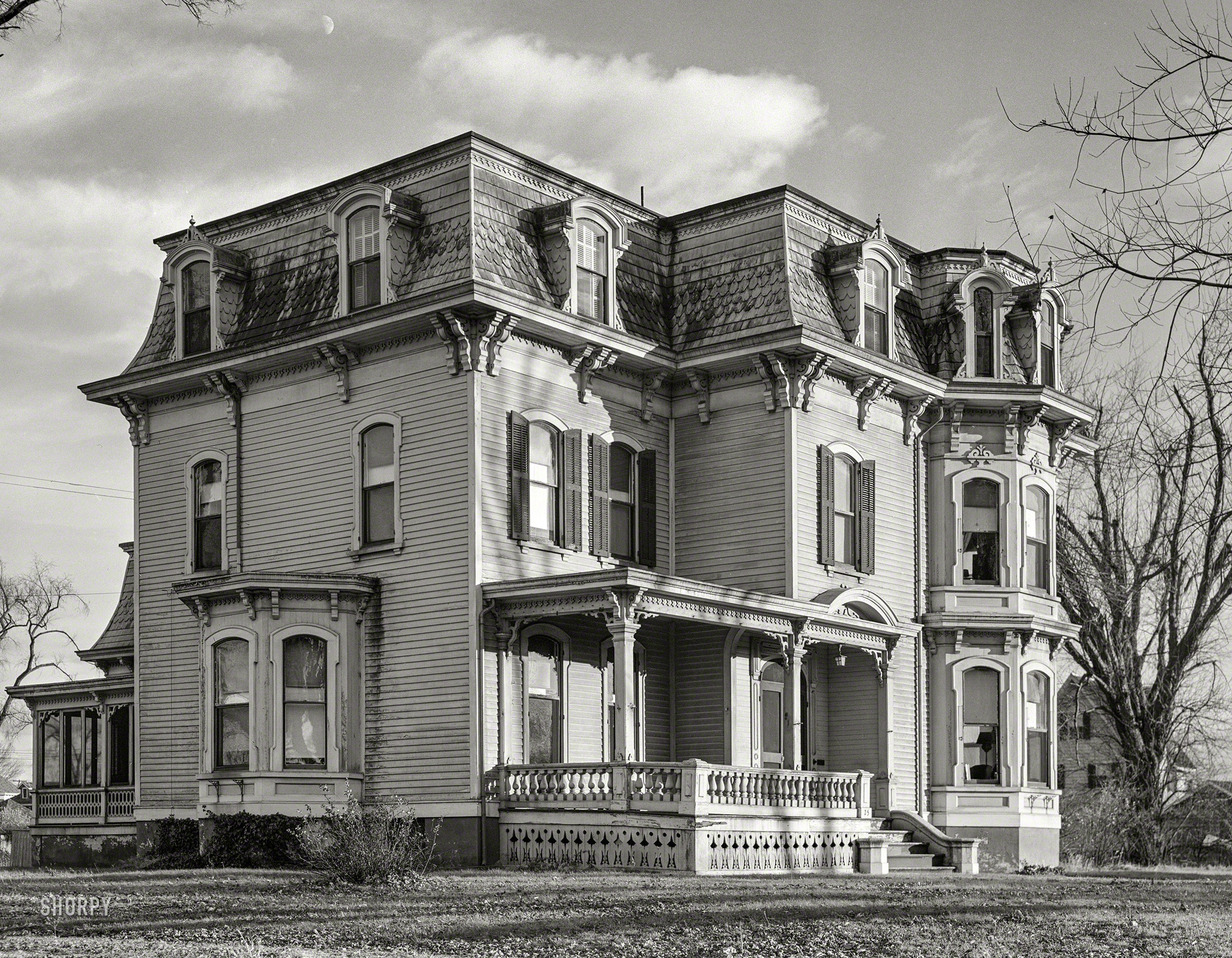 November 1940. "House, late afternoon. Mystic, Connecticut." Also a late-afternoon moon. Medium format negative by Jack Delano. View full size.