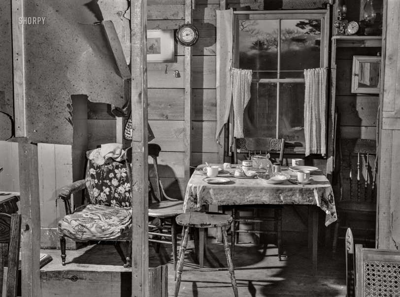 December 1940. "Bath, Maine. War boom in a New England industrial town. Inside the home of Ralph Hart, a worker at the shipyards. The house is one of a small settlement of shacks springing up a few miles out of Bath." Acetate negative by Jack Delano. View full size.
