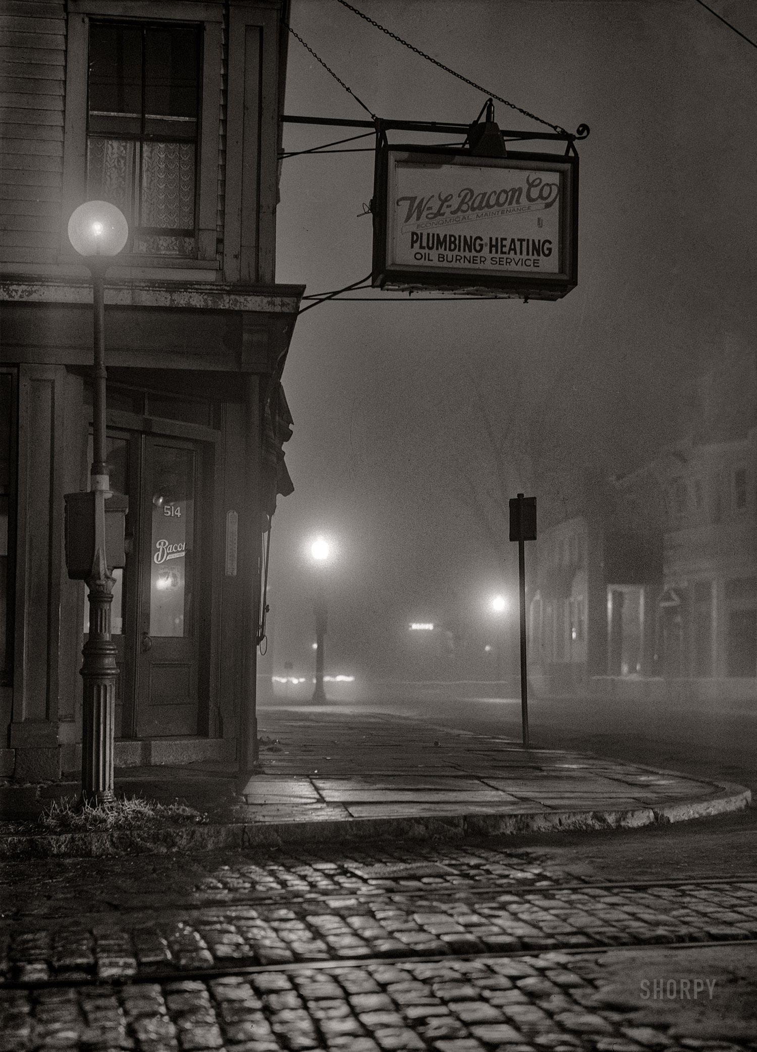 January 17, 1941. "On a foggy night in New Bedford, Massachusetts." Medium format acetate negative by Jack Delano for the Farm Security Administration. View full size.