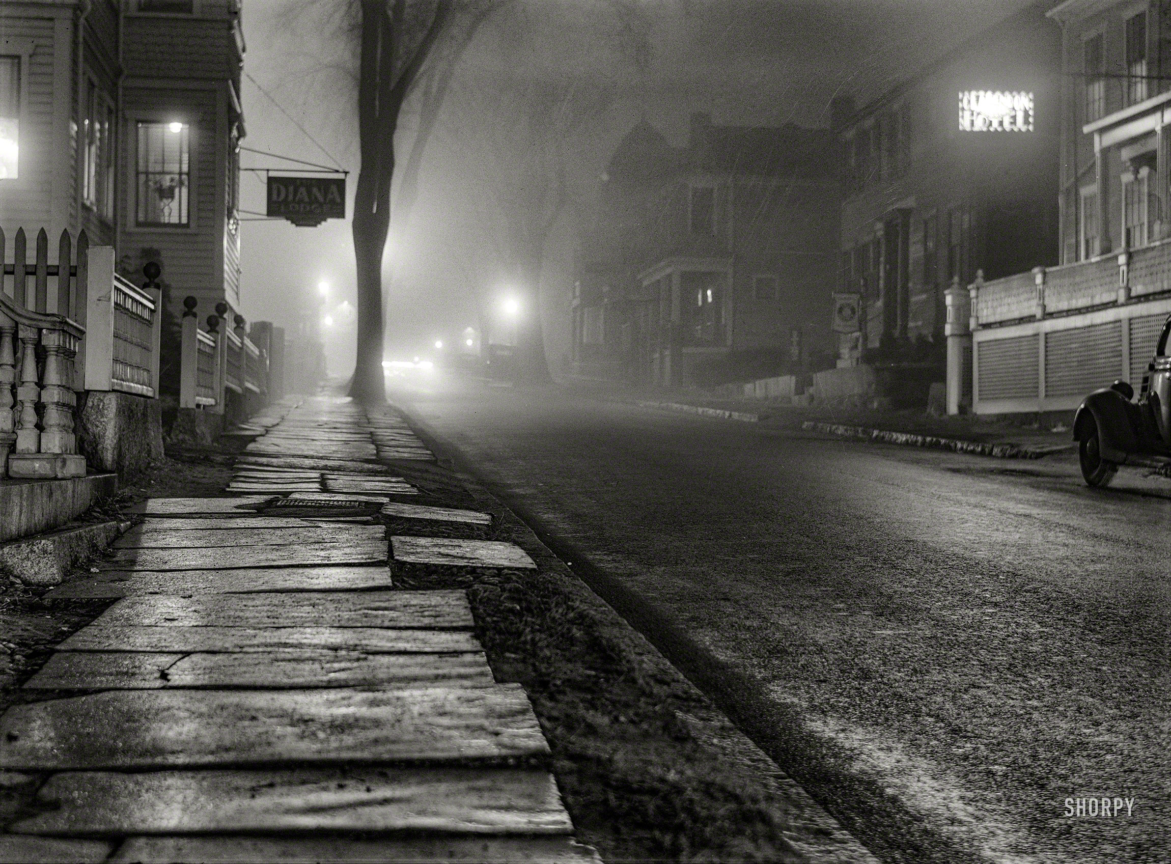 January 1941. "New Bedford, Massachusetts. Street at night during a fog." Acetate negative by Jack Delano for the Farm Security Administration. View full size.