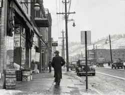 January 1941. "Main street in the steel town of Midland, Pennsylvania." Acetate negative by Jack Delano for the Farm Security Administration. View full size.