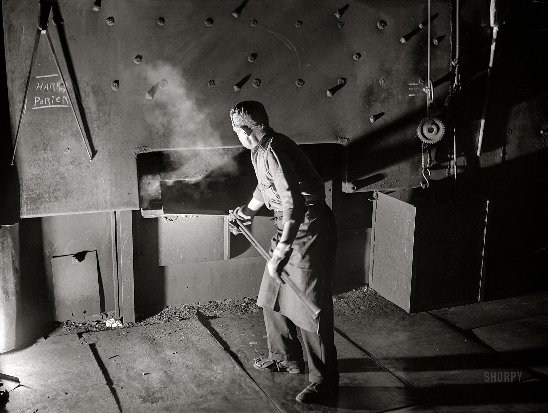 January 1941. "Worker at furnace in Washington Tinplate Company in Washington, Pennsylvania." Photo by Jack Delano for the Farm Security Administration. View full size.