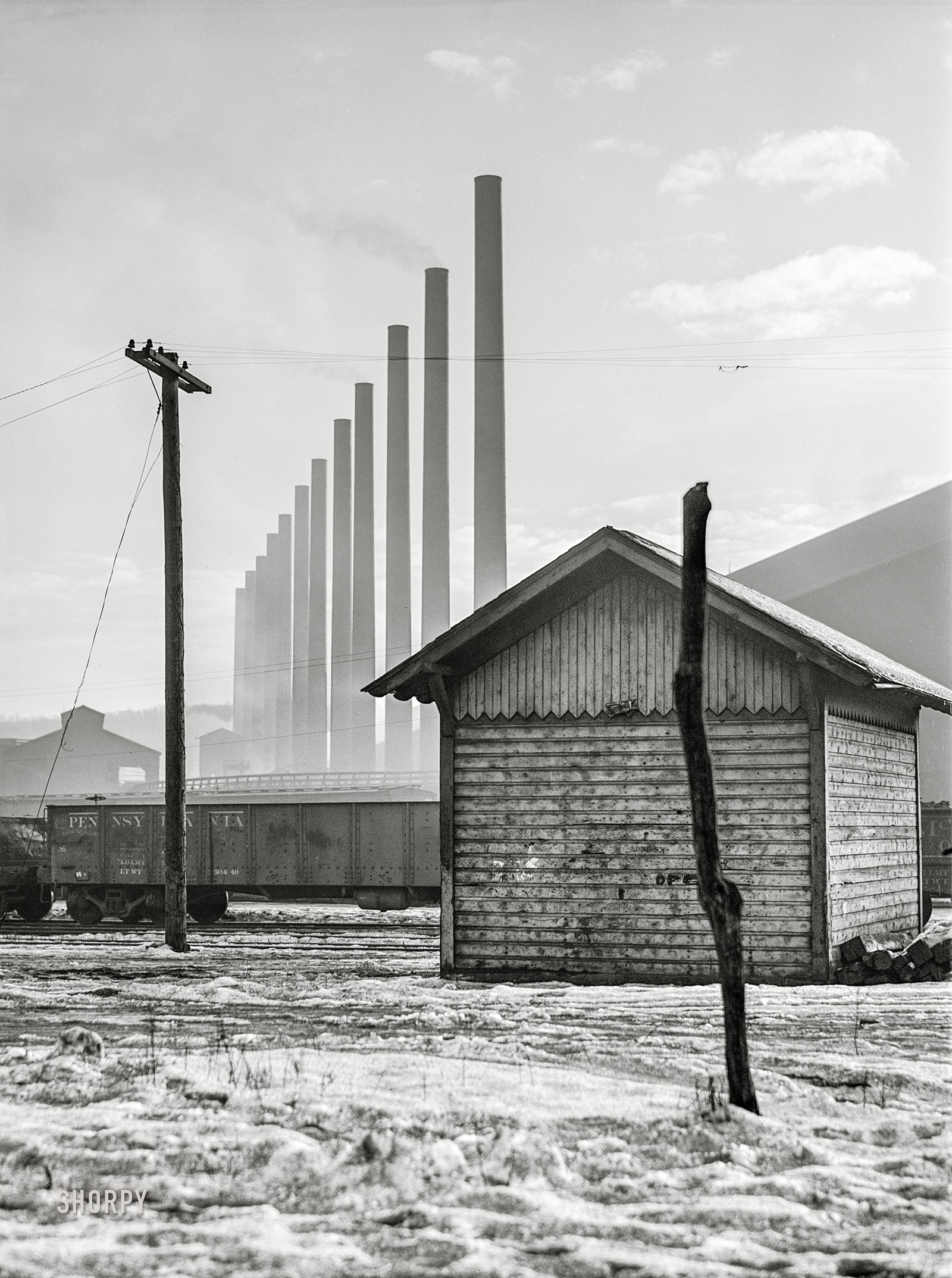 January 1941. "Stacks at the Pittsburgh Crucible Steel Company in Midland, Pennsylvania." Medium format negative by Jack Delano for the Farm Security Administration. View full size.