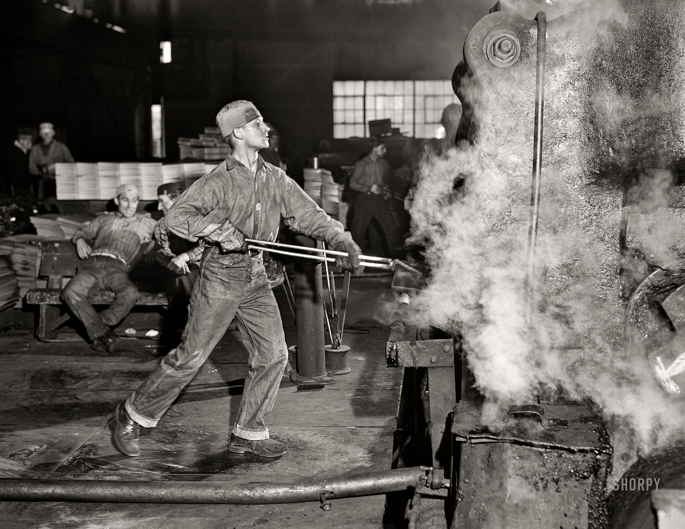 January 1941. "At one of the rolling machines in the Washington Tinplate Company. Washington Pennsylvania." Acetate negative by Jack Delano. View full size.