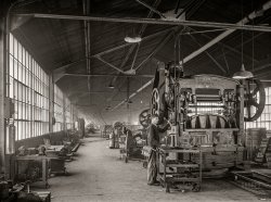 January 1941. "Punch press at the Washington Tinplate Works. Washington, Pennsylvania." Acetate negative by Jack Delano for the Farm Security Administration. View full size.