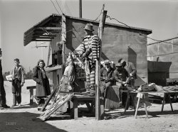 March 1941. "Part of the exhibit of the traveling show 'crime museum' near Fort Bragg, North Carolina." Acetate negative by Jack Delano. View full size.