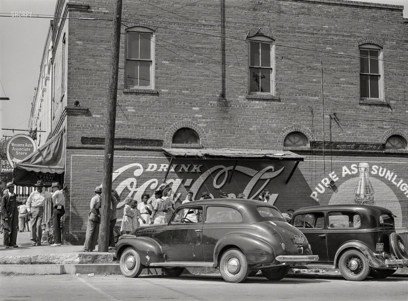 May 1941. "Street corner in Greensboro, Greene County, Georgia." Medium format negative by Jack Delano for the Farm Security Administration. View full size.