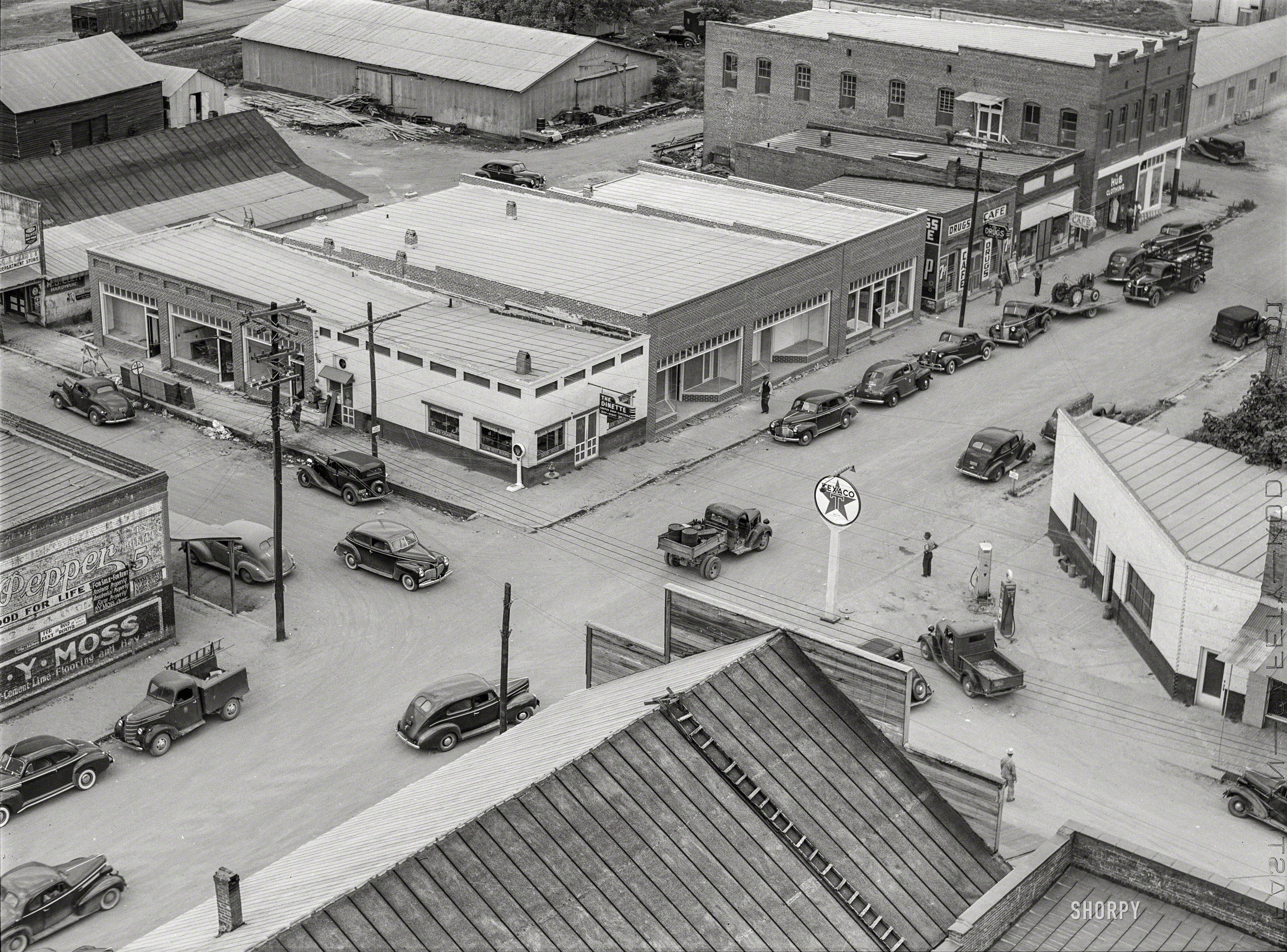 May 1941. "Intersection of the two main streets of Childersburg, Alabama." Acetate negative by Jack Delano for the Farm Security Administration. View full size.