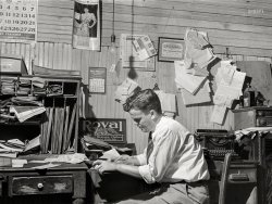 June 1941. "Mr. Cary Williams, editor of the Greensboro Herald Journal, a newspaper in Greensboro, Georgia." In whatever the opposite of the "paperless office" is. Medium format negative by Jack Delano. View full size.