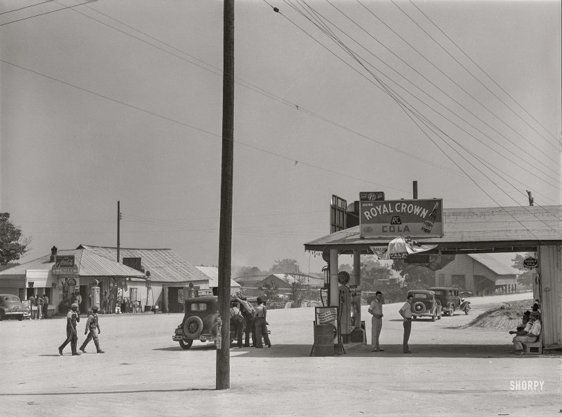 June 1941. "The center of Woodville. Greene County, Georgia." Medium format acetate negative by Jack Delano for the Farm Security Administration. View full size.
