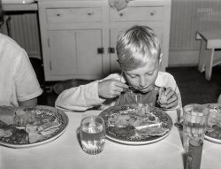 June 1941. "Eating a five-cent hot lunch at the Woodville public school. Greene County, Georgia." Happy Thanksgiving from Shorpy! Photo by Jack Delano. View full size.