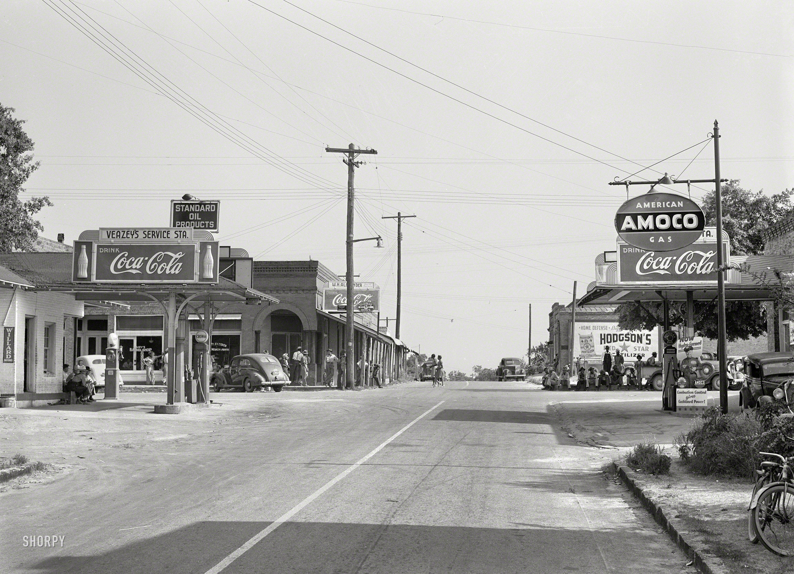 June 1941. "Main street of Siloam, Greene County, Georgia." Medium format negative by Jack Delano for the Farm Security Administration. View full size.