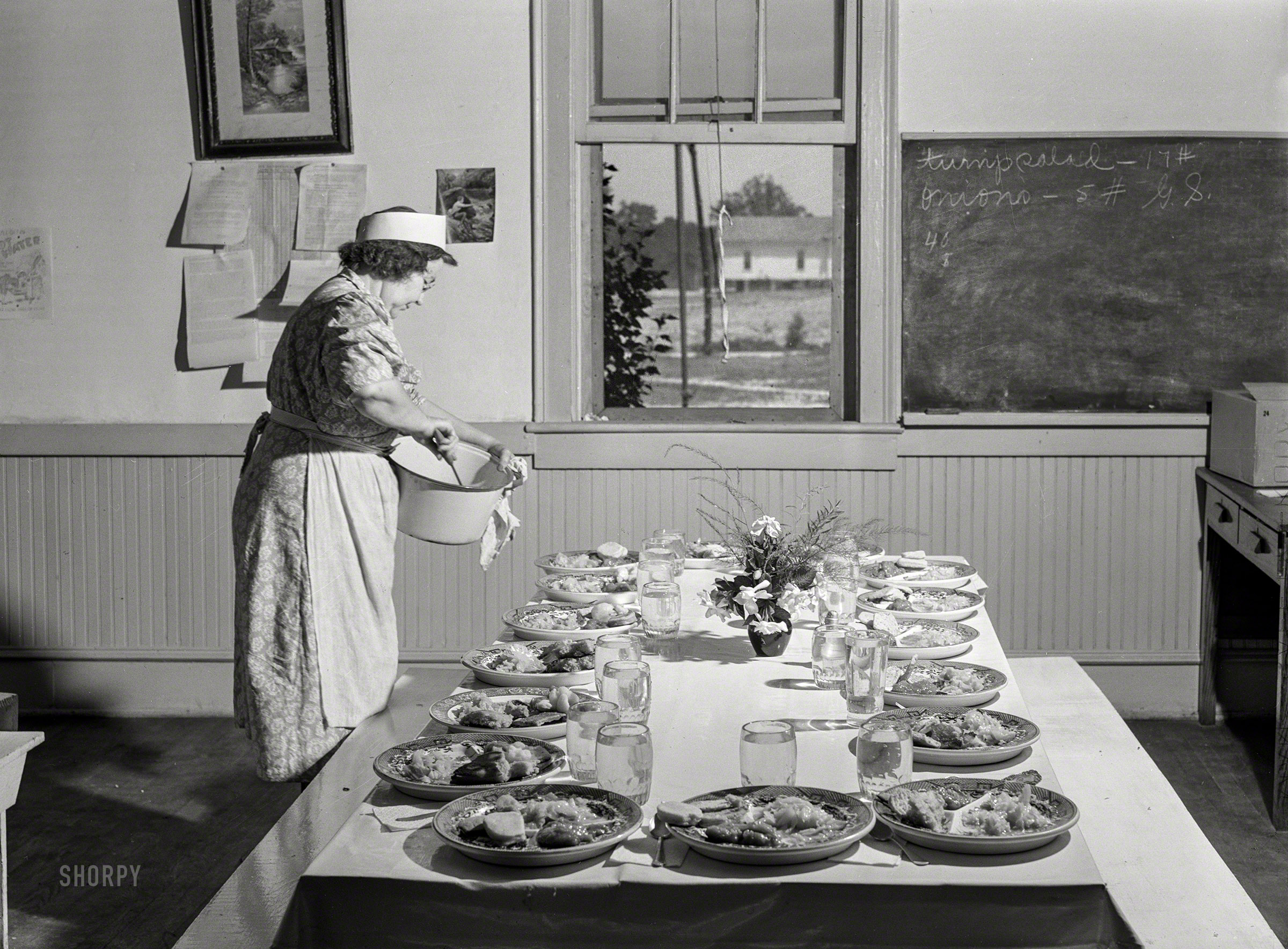 June 1941. "Five-cent hot lunches at the Woodville public school. Greene County, Georgia." Medium format negative by Jack Delano for the Farm Security Administration. View full size.