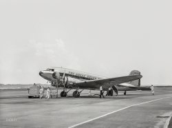 July 1941. "An airliner being readied for a takeoff. Municipal airport, Washington, D.C." Five years hence, this brand-new Eastern Air Lines DC-3 ended up on the wrong track. Medium format negative by Jack Delano. View full size.